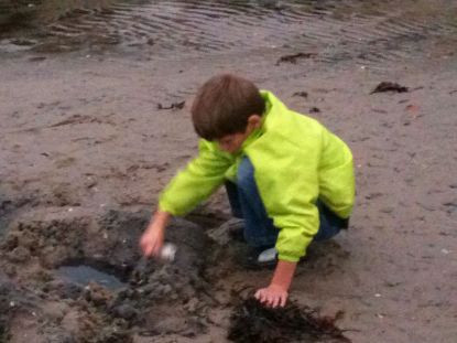 Nephew Esben digging at the beach in Fredericia